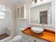 Beautiful bathroom with a stylish vanity, ample counter space, and a tiled walk-in shower at 990 W French Ave, Orange City, FL 32763