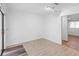 Bright living room with sliding glass doors and wood-look flooring at 990 W French Ave, Orange City, FL 32763