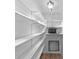 Pantry with shelves and microwave at 990 W French Ave, Orange City, FL 32763