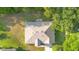 An aerial view of the home featuring a well maintained roof and landscaping at 1120 W Glen Falls Rd, Deland, FL 32720
