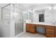Bathroom featuring a walk-in shower, and a vanity with a large mirror at 1120 W Glen Falls Rd, Deland, FL 32720