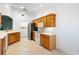 Well-lit kitchen with stainless steel appliances and plenty of cabinet storage at 1120 W Glen Falls Rd, Deland, FL 32720