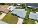 Aerial view of property showcasing the home, yard, and neighborhood at 114 Ocean Aire N Ter, Ormond Beach, FL 32176