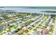 Beautiful aerial view of the home in a charming neighborhood with lots of palm trees at 114 Ocean Aire N Ter, Ormond Beach, FL 32176