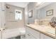Clean bathroom featuring a tub-shower, granite vanity, and neutral walls at 114 Ocean Aire N Ter, Ormond Beach, FL 32176