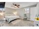 Comfortable main bedroom with hardwood floors, a ceiling fan, and plenty of natural light at 114 Ocean Aire N Ter, Ormond Beach, FL 32176