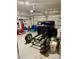 Garage featuring car chasis and a variety of tools at 119 Fishermans Cove Dr, Edgewater, FL 32141
