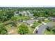 An aerial view of a home in a neighborhood with mature trees and a fenced backyard at 1191 Tracy Dr, Port Orange, FL 32129