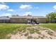 Spacious backyard featuring a patio area, perfect for outdoor dining and relaxation at 1191 Tracy Dr, Port Orange, FL 32129