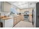 Charming kitchen with wood countertops, stainless steel appliances, and natural light at 1191 Tracy Dr, Port Orange, FL 32129