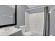 Bathroom with a shower-tub combo and a modern sink at 1194 Balfour Dr, Deltona, FL 32725