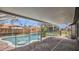 Enclosed patio and private pool, framed with brick pavers and screened for outdoor living at 1194 Balfour Dr, Deltona, FL 32725