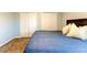 Main bedroom features carpet, neutral walls, headboard and built-in closet at 12079 Alder Branch Loop, Orlando, FL 32824