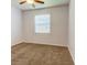 Neutral bedroom featuring carpet and a window at 12079 Alder Branch Loop, Orlando, FL 32824