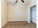 Empty bedroom featuring neutral walls, carpet, and a closet at 12079 Alder Branch Loop, Orlando, FL 32824