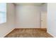 This bedroom features carpet flooring, natural light, and fresh neutral paint at 12079 Alder Branch Loop, Orlando, FL 32824