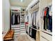 Walk-in closet with built-in shelving and ample storage space at 12079 Alder Branch Loop, Orlando, FL 32824