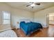 Comfortable bedroom with a plush bed, large windows, and natural light at 1233 Girog Ave, Port Orange, FL 32129