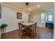 Open dining area featuring modern lighting, tile flooring, and seamless flow to adjacent living spaces at 1233 Girog Ave, Port Orange, FL 32129