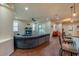 Spacious living room featuring a comfortable sofa, tile flooring, and natural light from large windows and sliding doors at 1233 Girog Ave, Port Orange, FL 32129