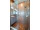 Modern shower with glass enclosure, tiled walls, and updated fixtures, creating a spa-like experience at 1233 Girog Ave, Port Orange, FL 32129
