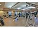 Well-equipped fitness center featuring a variety of weight machines, treadmills, and free weights at 1386 Brayford Pt, Deland, FL 32724