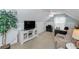 Bonus room includes a ceiling fan, natural light, and a wall-mounted air conditioner at 1412 Bent Oaks Blvd, Deland, FL 32724