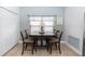 Cozy dining nook with seating for four and tile floors at 1412 Bent Oaks Blvd, Deland, FL 32724