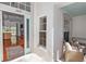 Bright and welcoming entryway with a view of a living room and outdoor scenery at 1412 Bent Oaks Blvd, Deland, FL 32724