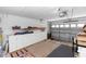 Garage equipped with storage solutions, built-in cabinets, and space for vehicle parking at 1412 Bent Oaks Blvd, Deland, FL 32724