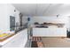 Garage boasts built-in cabinets, storage racks, and water heater for convenient storage solutions at 1412 Bent Oaks Blvd, Deland, FL 32724