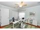 Functional home office with hardwood floors, natural light, and practical storage solutions at 1412 Bent Oaks Blvd, Deland, FL 32724