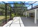 Spacious screened porch with ample room for outdoor entertaining and dining at 1412 Bent Oaks Blvd, Deland, FL 32724
