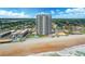 Coastal high-rise condo building with a pool, offering stunning ocean views and beach access at 1420 N Atlantic Ave # 202, Daytona Beach, FL 32118
