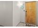 Apartment 202 door with a nautical 'welcome' sign and digital lock at 1420 N Atlantic Ave # 202, Daytona Beach, FL 32118