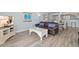 Cozy living space with laminate flooring, comfortable furniture, and inviting decor at 1420 N Atlantic Ave # 202, Daytona Beach, FL 32118