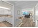 Spacious hallway leading to an open-concept living area with ocean views and modern amenities at 1420 N Atlantic Ave # 202, Daytona Beach, FL 32118