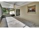 Screened porch with ceiling fan and sliding glass door, perfect for outdoor living at 1562 Monroe St, Deland, FL 32720