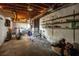 Unfinished basement with ample storage space and exposed wooden ceiling at 1608 Raleigh Ave, Daytona Beach, FL 32117