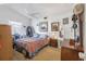 Bedroom featuring carpet, bed, fan, and decorations at 1608 Raleigh Ave, Daytona Beach, FL 32117