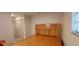Bedroom with built in headboard and view of the double door closet at 1621 Anniston Ave, Daytona Beach, FL 32117