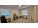 Bright bedroom with windows and blinds showcasing light gray flooring and an inviting atmosphere at 1621 Anniston Ave, Daytona Beach, FL 32117