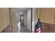 Bright entryway with brick accents, tiled flooring, and a glimpse of the home's interior at 1621 Anniston Ave, Daytona Beach, FL 32117
