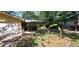 Charming single Gathering home with well-maintained front yard and an attached two-car garage at 1621 Anniston Ave, Daytona Beach, FL 32117