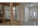 Entryway with wood-style flooring and a glass cabinet, leading to the front door at 1621 Anniston Ave, Daytona Beach, FL 32117