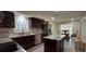 Updated kitchen with a center island, sleek stainless steel appliances, and ample natural light at 1621 Anniston Ave, Daytona Beach, FL 32117