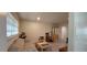 Comfortable living room area featuring light gray floors and a neutral color scheme at 1621 Anniston Ave, Daytona Beach, FL 32117