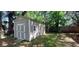 Shed exterior with a small porch and ample yard space at 1621 Anniston Ave, Daytona Beach, FL 32117