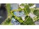 Aerial view showcasing a beautiful property with pool and well-defined property lines at 1653 Promenade Cir, Port Orange, FL 32129