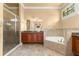 Bathroom with walk-in shower and soaking tub at 1653 Promenade Cir, Port Orange, FL 32129